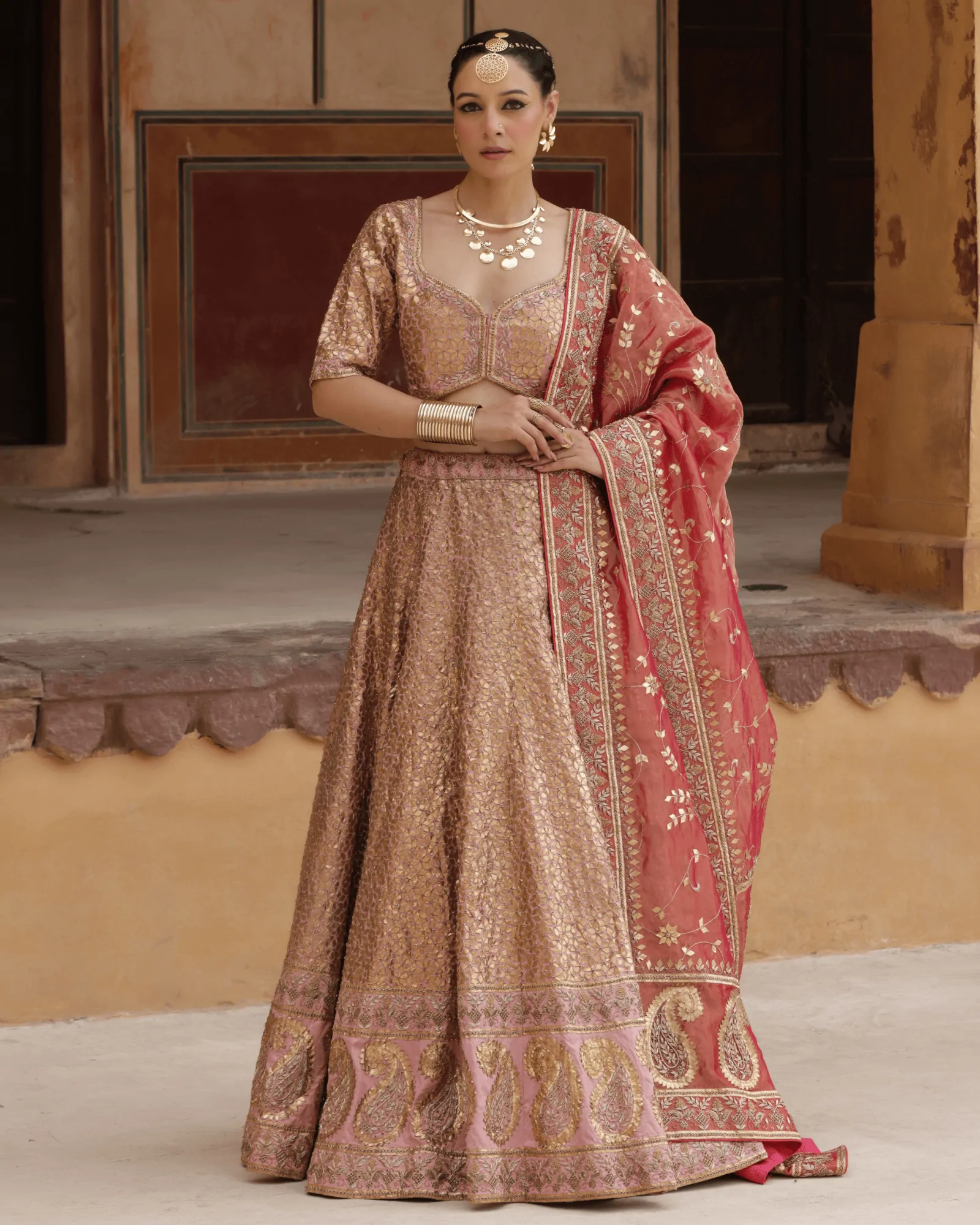 Peach Silk Kalidar Bridal Lehenga with Tamba Gota and Zardosi Tissue Dupatta