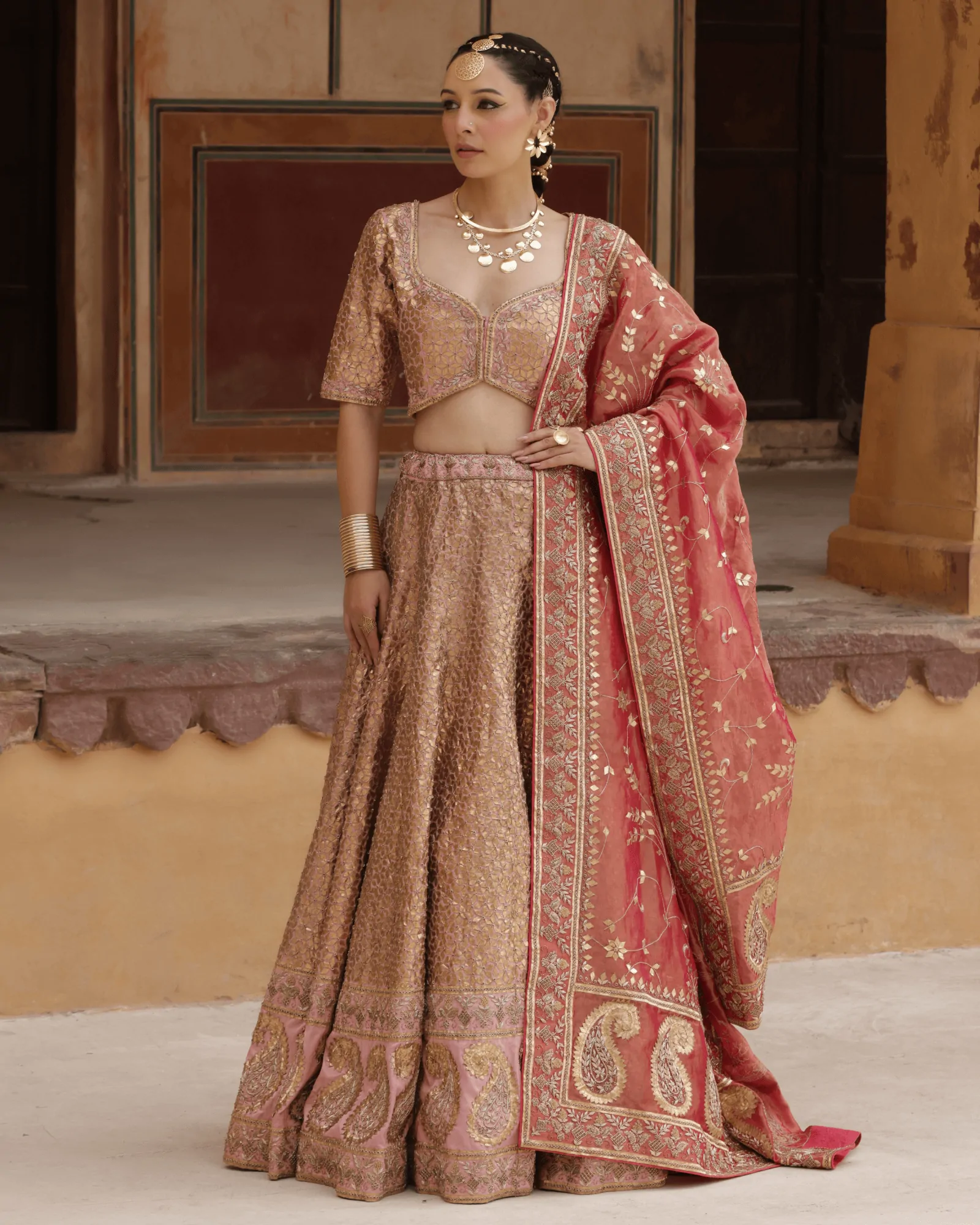 Peach Silk Kalidar Bridal Lehenga with Tamba Gota and Zardosi Tissue Dupatta