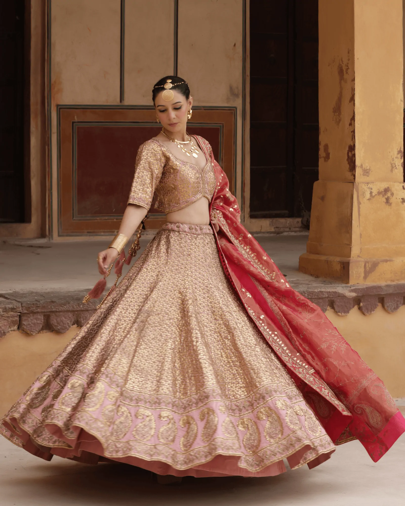 Peach Silk Kalidar Bridal Lehenga with Tamba Gota and Zardosi Tissue Dupatta